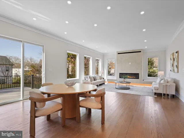 a view of an entryway with wooden floor and stairs