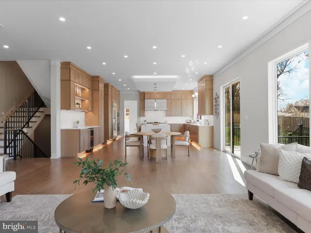 a view of a hallway and a kitchen with sink