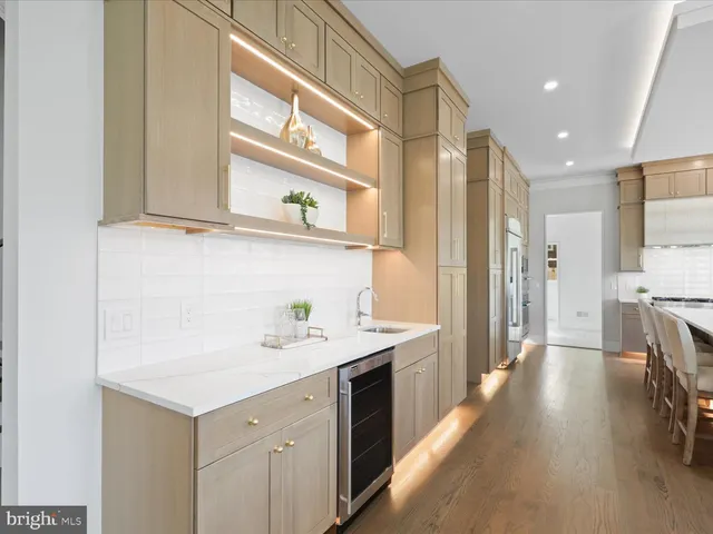 a kitchen with a stove and a refrigerator