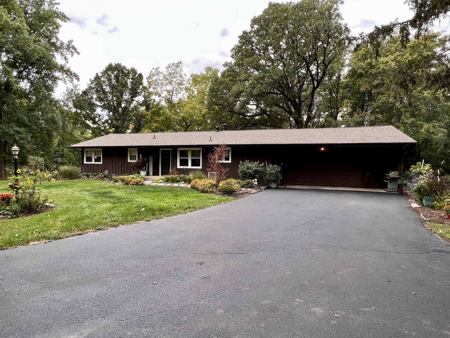 9128 North 1900 East Road Bloomington, IL 61705 - Photo 1 of 36 a view of house with yard and green space