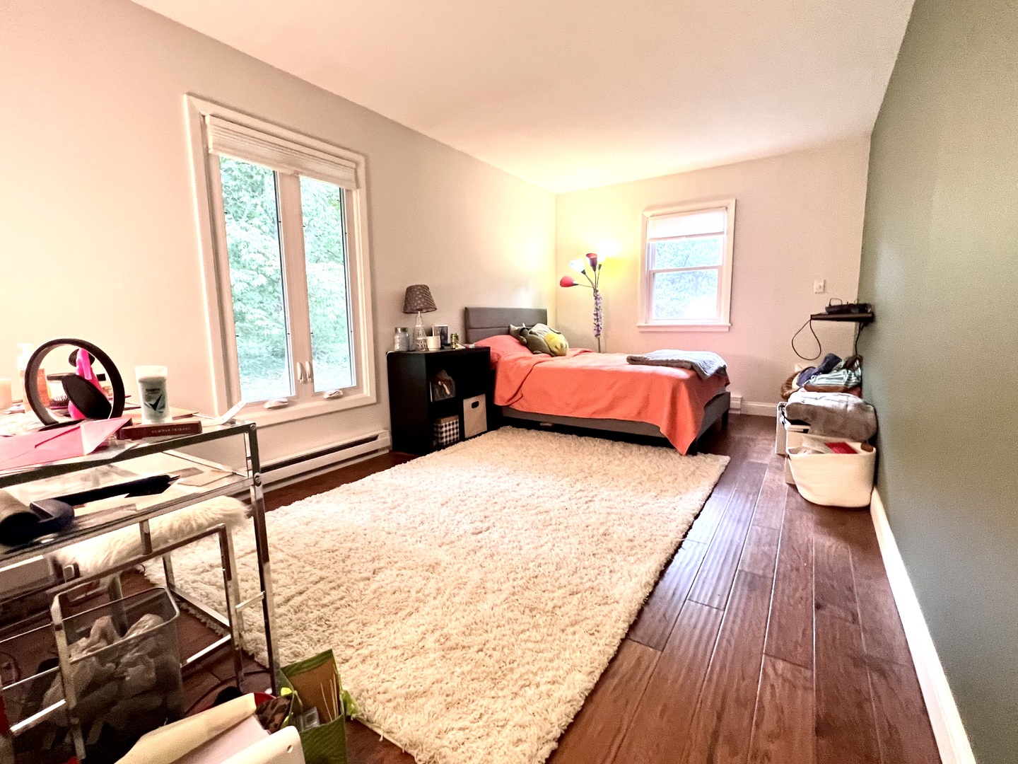 9128 North 1900 East Road Bloomington, IL 61705 - Photo 26 of 36 a bedroom with a bed and wooden floor