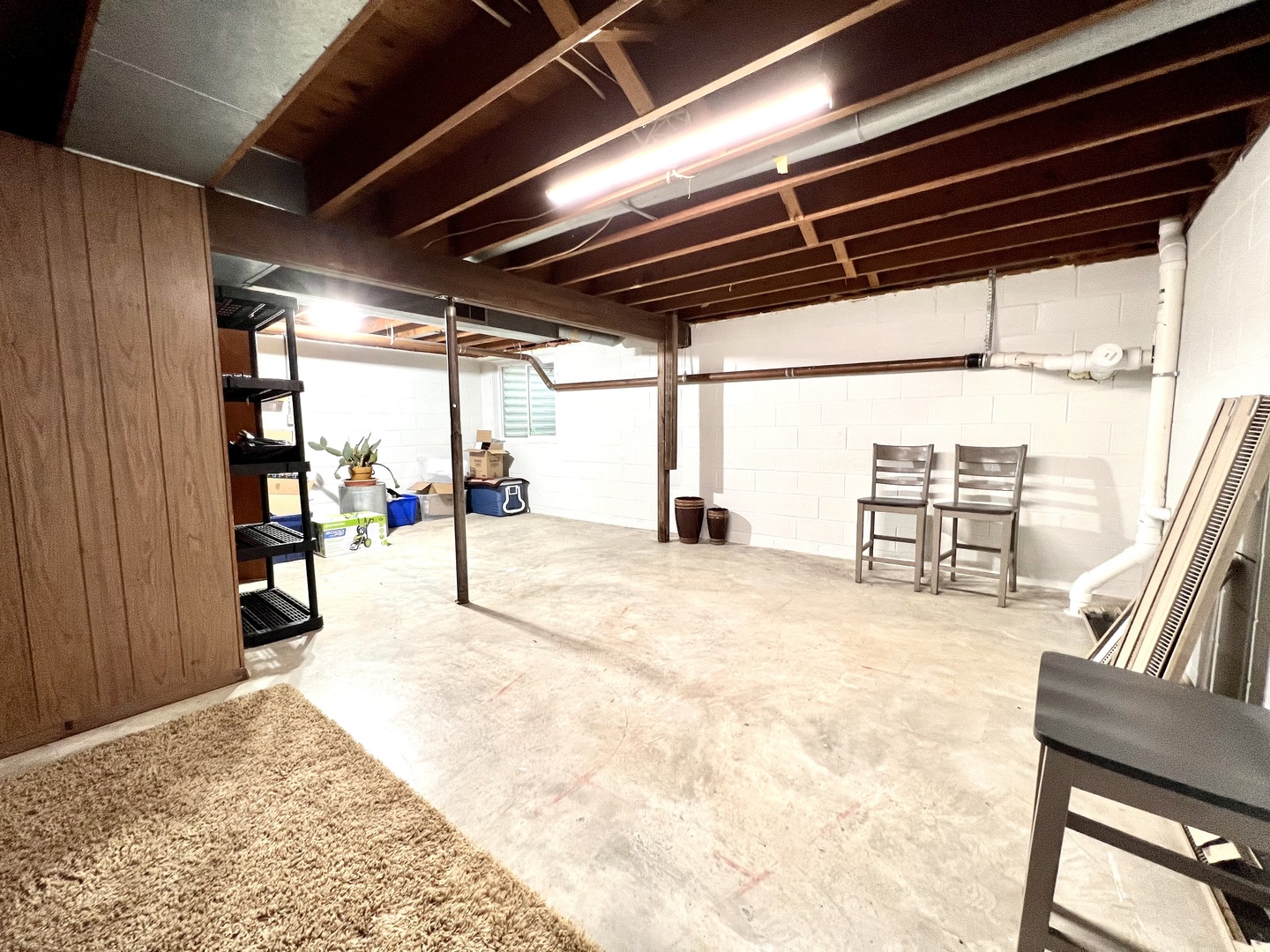 9128 North 1900 East Road Bloomington, IL 61705 - Photo 32 of 36 a view of an empty room with wooden floor