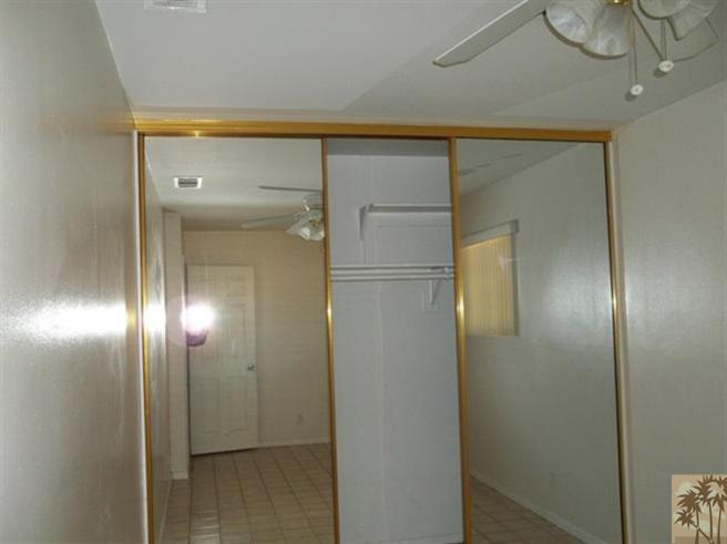 70130 Chappel Road Rancho Mirage, CA 92270 - Photo 11 of 20 a bathroom with a glass shower door
