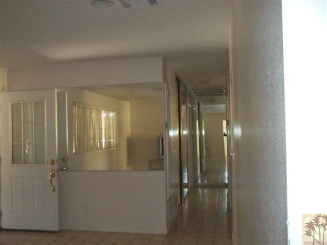 70130 Chappel Road Rancho Mirage, CA 92270 - Photo 12 of 20 a bathroom with a glass shower door