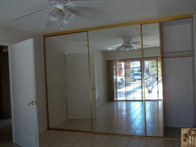 70130 Chappel Road Rancho Mirage, CA 92270 - Photo 5 of 20 a view of empty room with wooden floor and fan