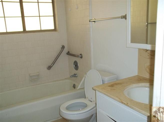 70130 Chappel Road Rancho Mirage, CA 92270 - Photo 6 of 20 a bathroom with a sink a toilet and a bathtub