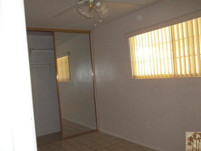 70130 Chappel Road Rancho Mirage, CA 92270 - Photo 7 of 20 a view of an empty room with a window