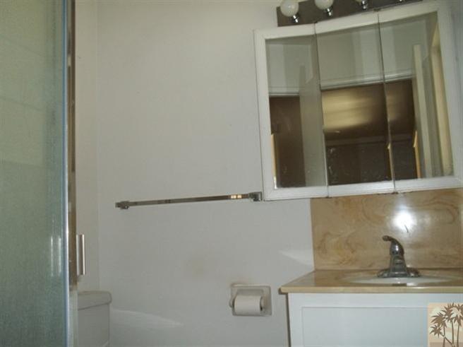 70130 Chappel Road Rancho Mirage, CA 92270 - Photo 9 of 20 a bathroom with a shower and a mirror