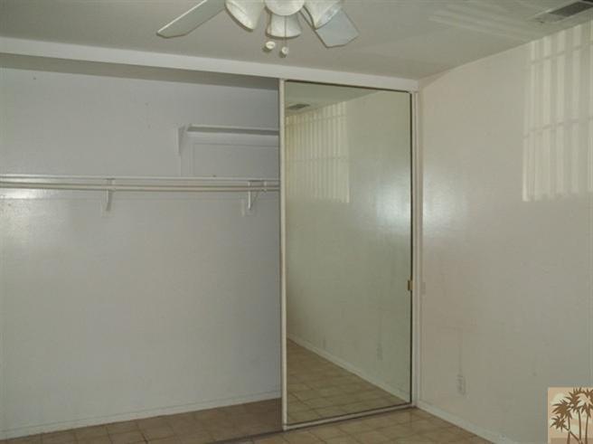 70130 Chappel Road Rancho Mirage, CA 92270 - Photo 10 of 20 a bathroom with a glass shower door