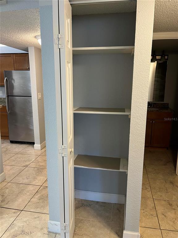 2630 Coconut Bay Lane, Unit 618 (61I) Sarasota, FL 34237 - Photo 8 of 29 a view of closet