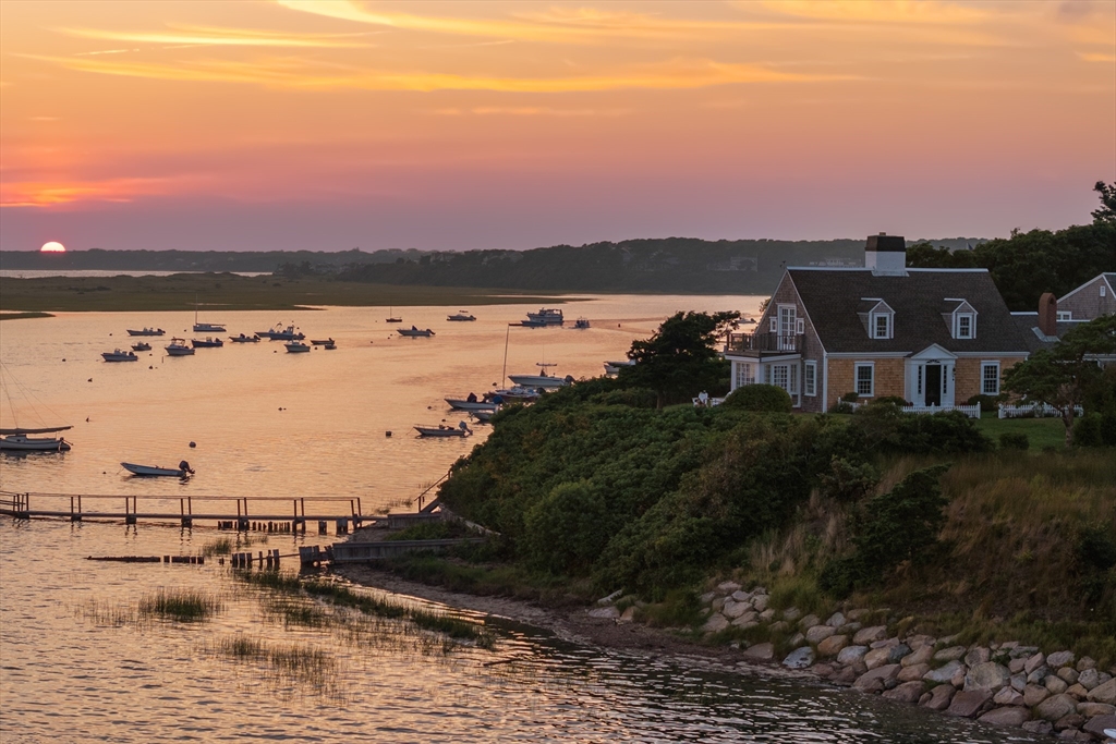 70 Sears Point Chatham, MA 02633 - Photo 1 of 42 a view of lake with boats and lake view