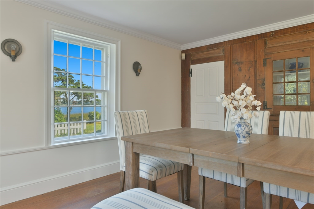 70 Sears Point Chatham, MA 02633 - Photo 16 of 42 a dining room with furniture and window