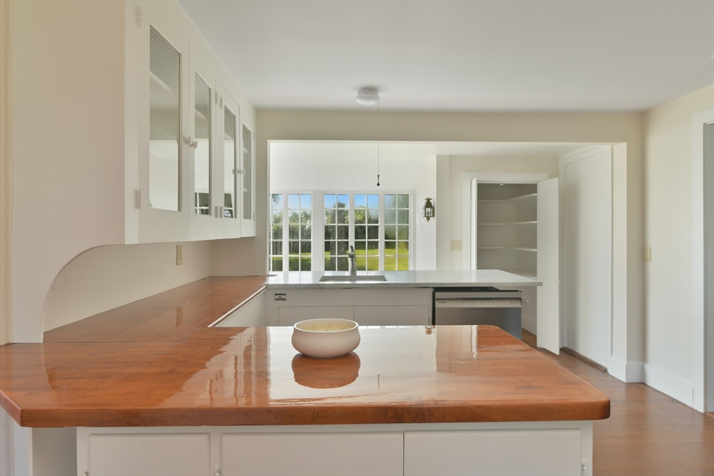 70 Sears Point Chatham, MA 02633 - Photo 19 of 42 a kitchen with a sink and a window