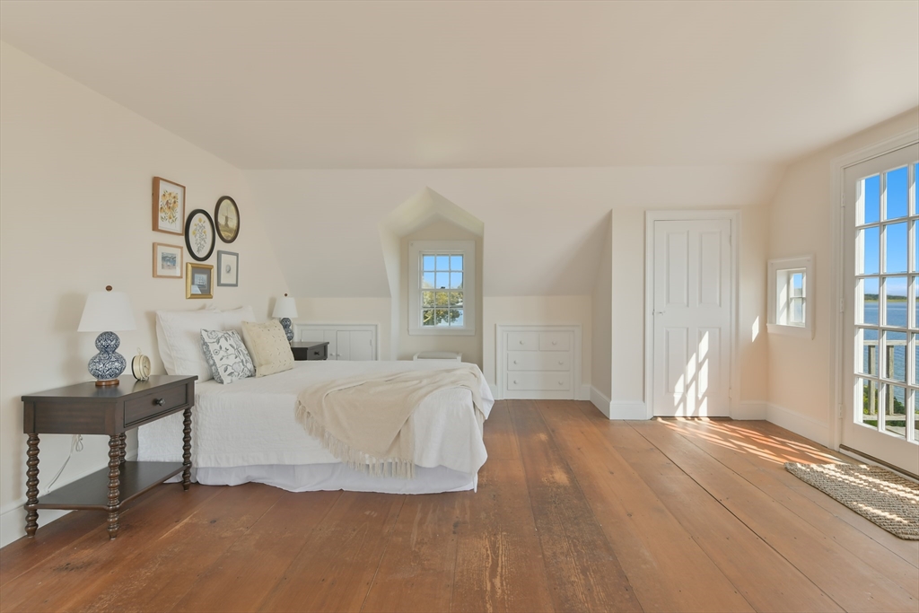 70 Sears Point Chatham, MA 02633 - Photo 24 of 42 a bedroom with a bed and a window
