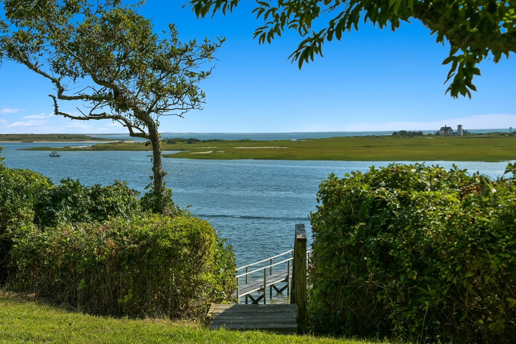 70 Sears Point Chatham, MA 02633 - Photo 34 of 42 a view of a lake with a big yard