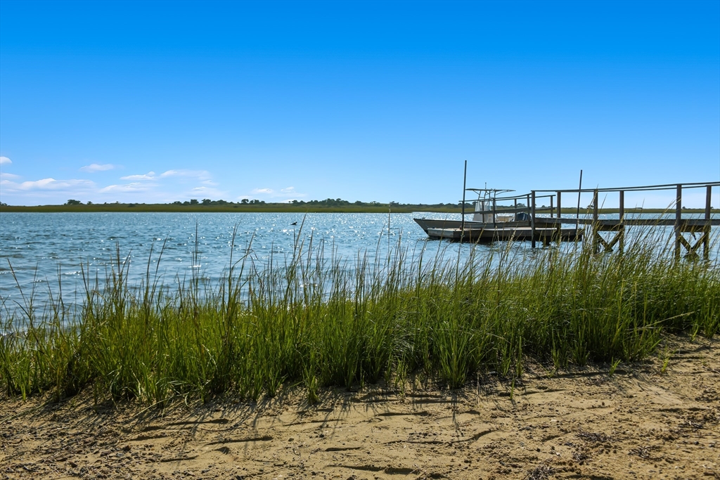 70 Sears Point Chatham, MA 02633 - Photo 35 of 42 a view of a lake with boats and large trees