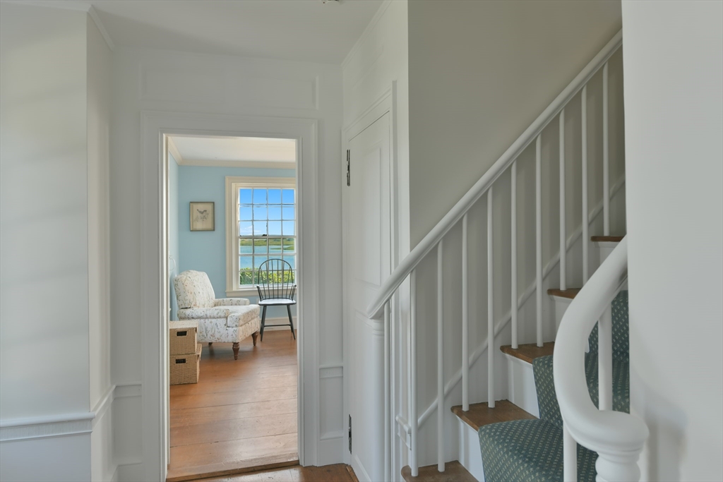 70 Sears Point Chatham, MA 02633 - Photo 7 of 42 a view of entryway and hall with wooden floor