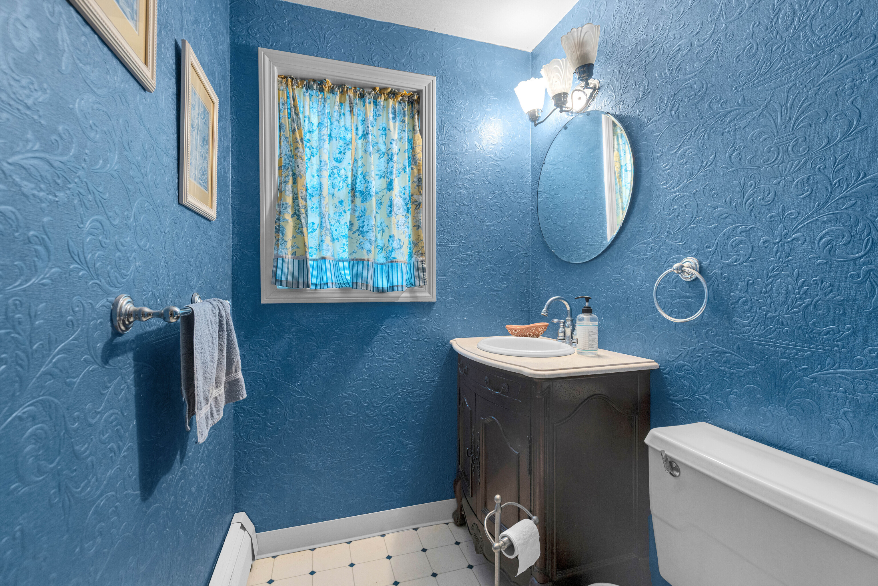 63 Timber Hill Road Cromwell, CT 06416 - Photo 13 of 29 a bathroom with a sink a toilet and a mirror