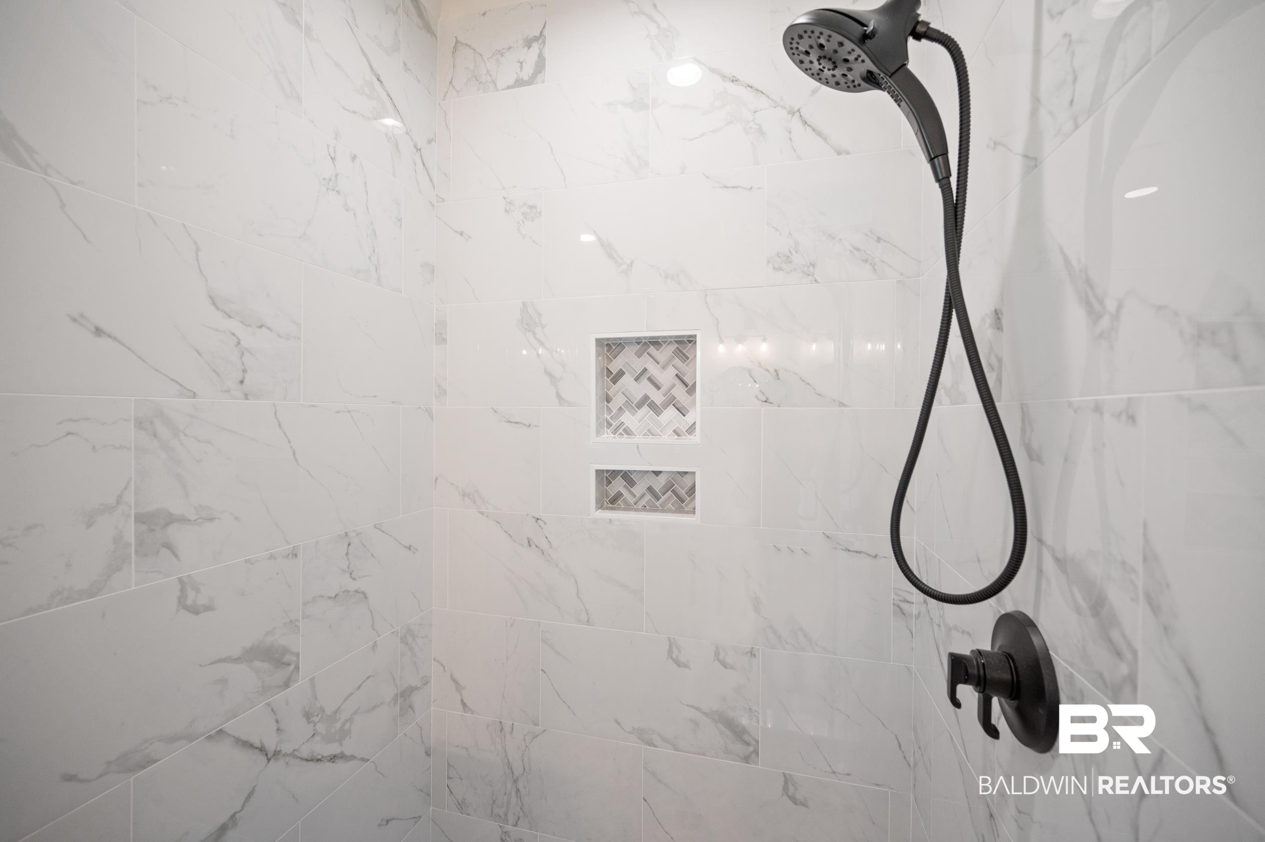 28889 Canal Road Orange Beach, AL 36561 - Photo 42 of 55 Interior details with a tile shower