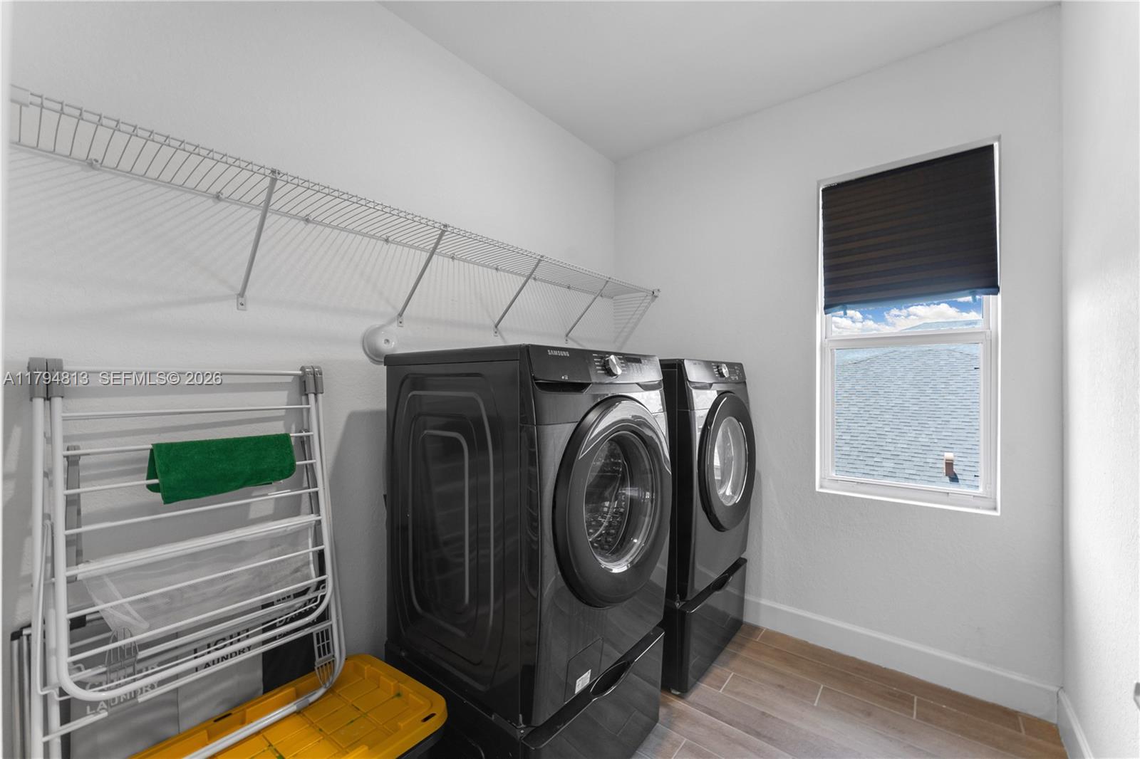13225 Southwest 272nd Street Homestead, FL 33032 - Photo 24 of 44 a utility room with dryer and washer