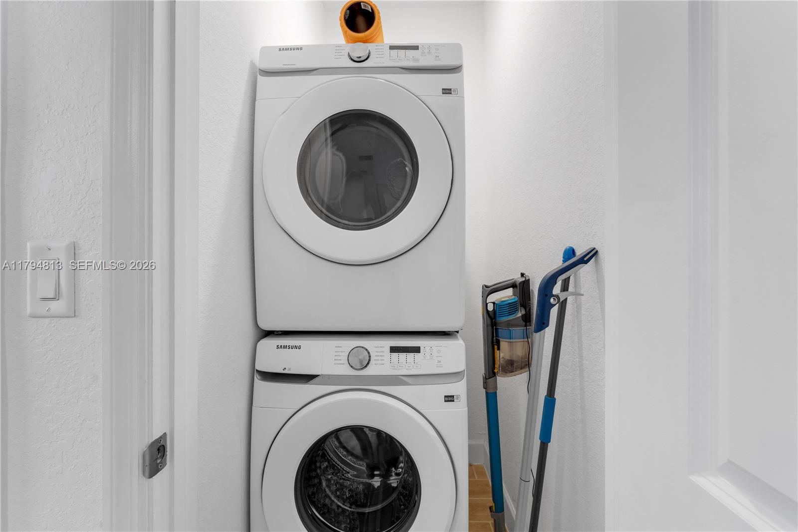 13225 Southwest 272nd Street Homestead, FL 33032 - Photo 33 of 44 a view of entryway with washer and dryer