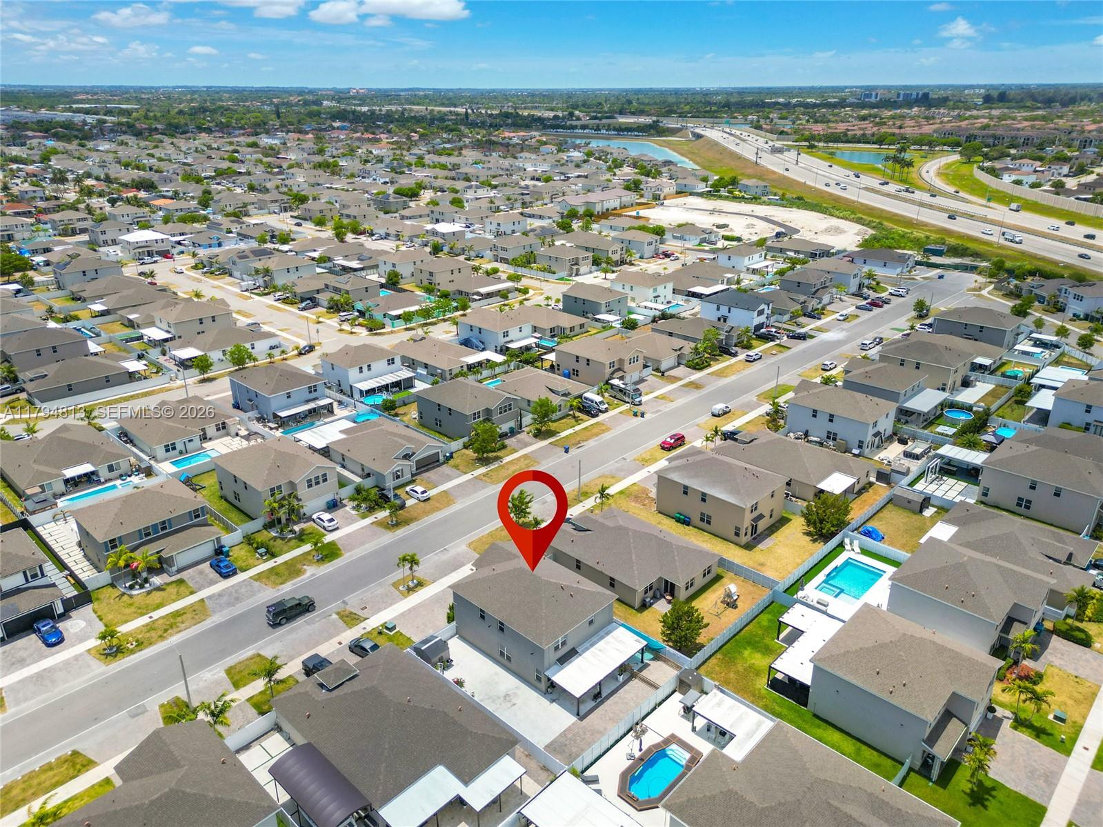 13225 Southwest 272nd Street Homestead, FL 33032 - Photo 41 of 44 an aerial view of a city