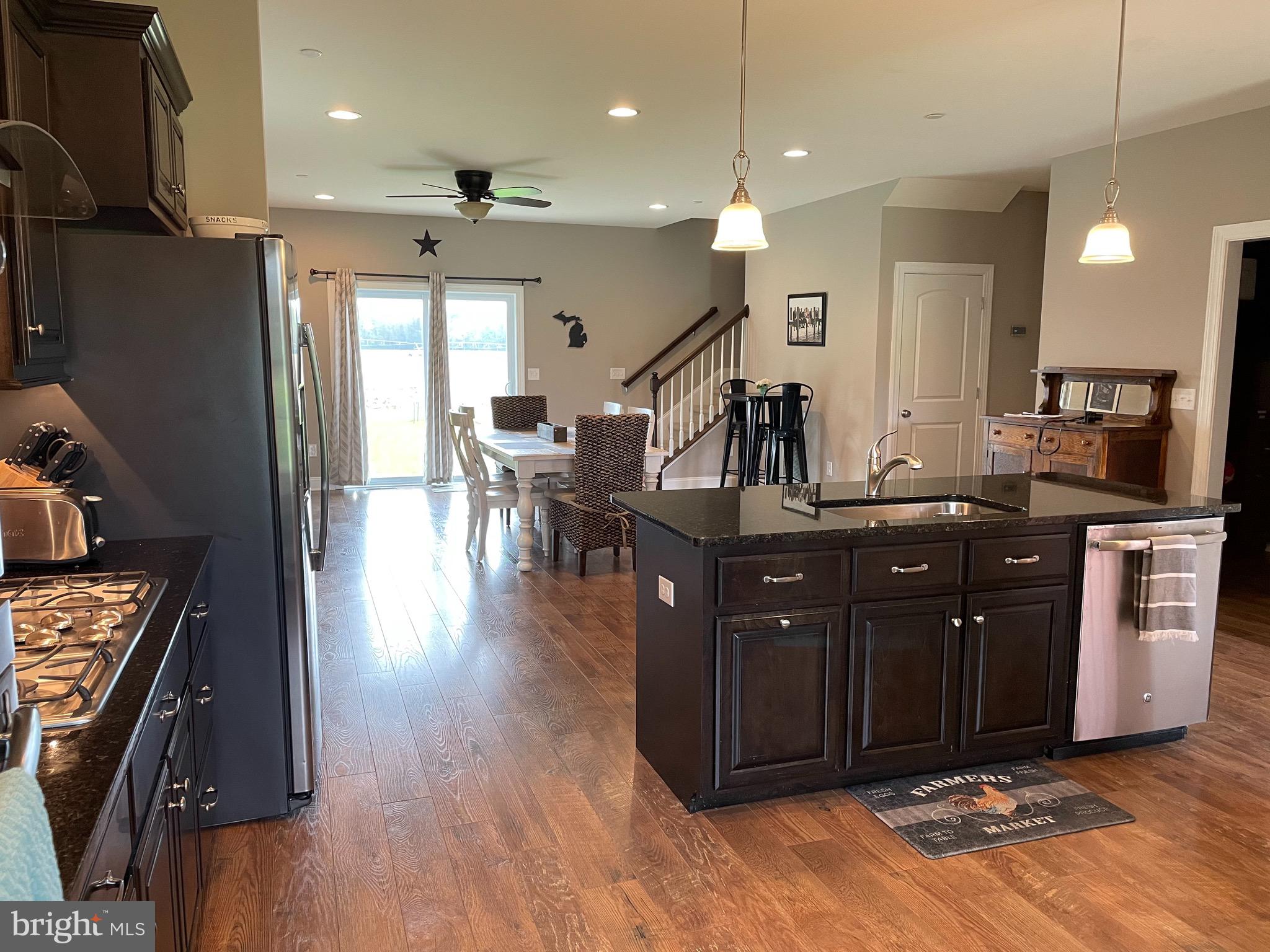 27980 Substation Road Denton, MD 21629 - Photo 18 of 48 Kitchen area opens to dining/living space.
