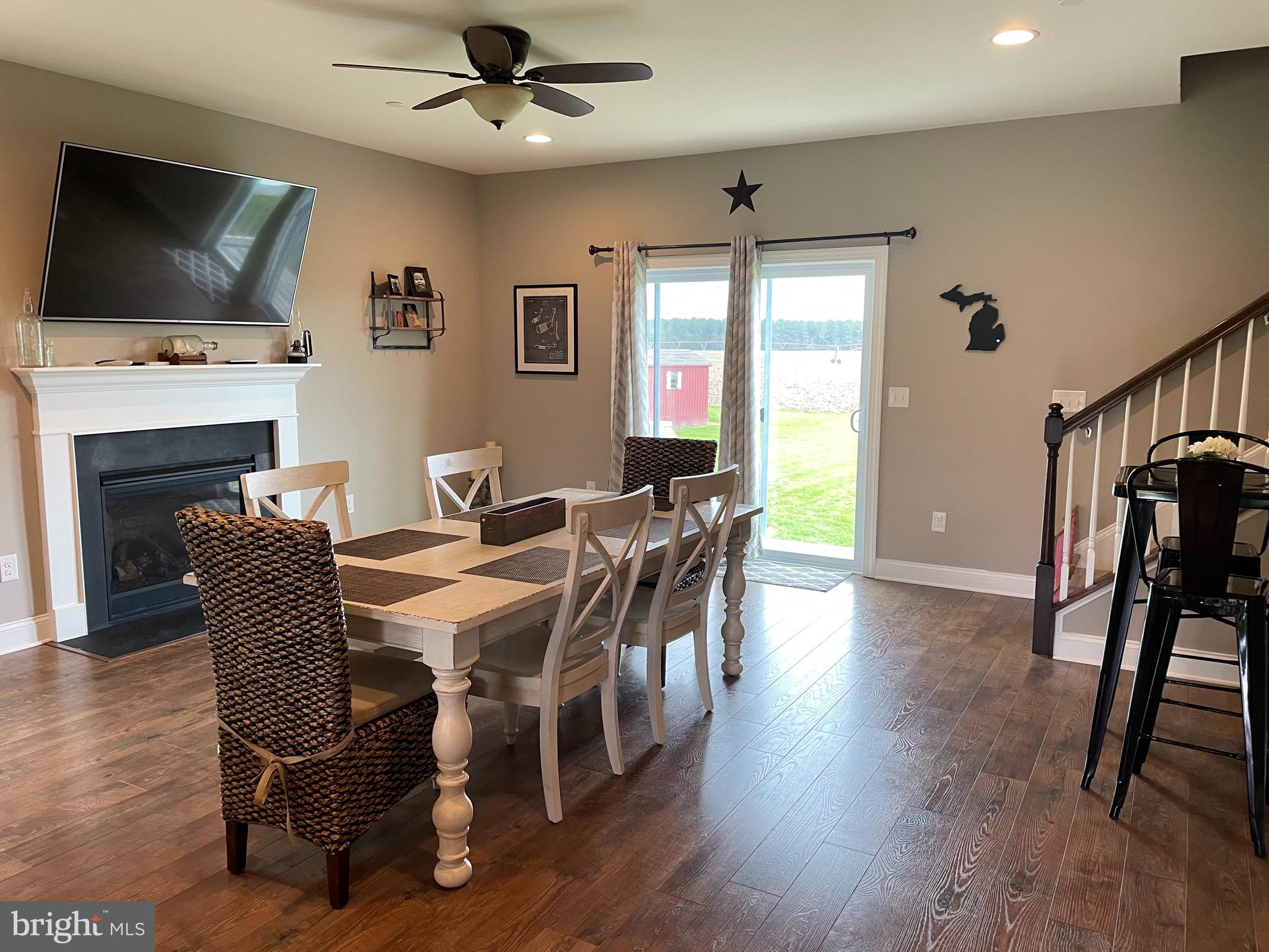 27980 Substation Road Denton, MD 21629 - Photo 20 of 48 Dining Area with gas fireplace. Slider leading out