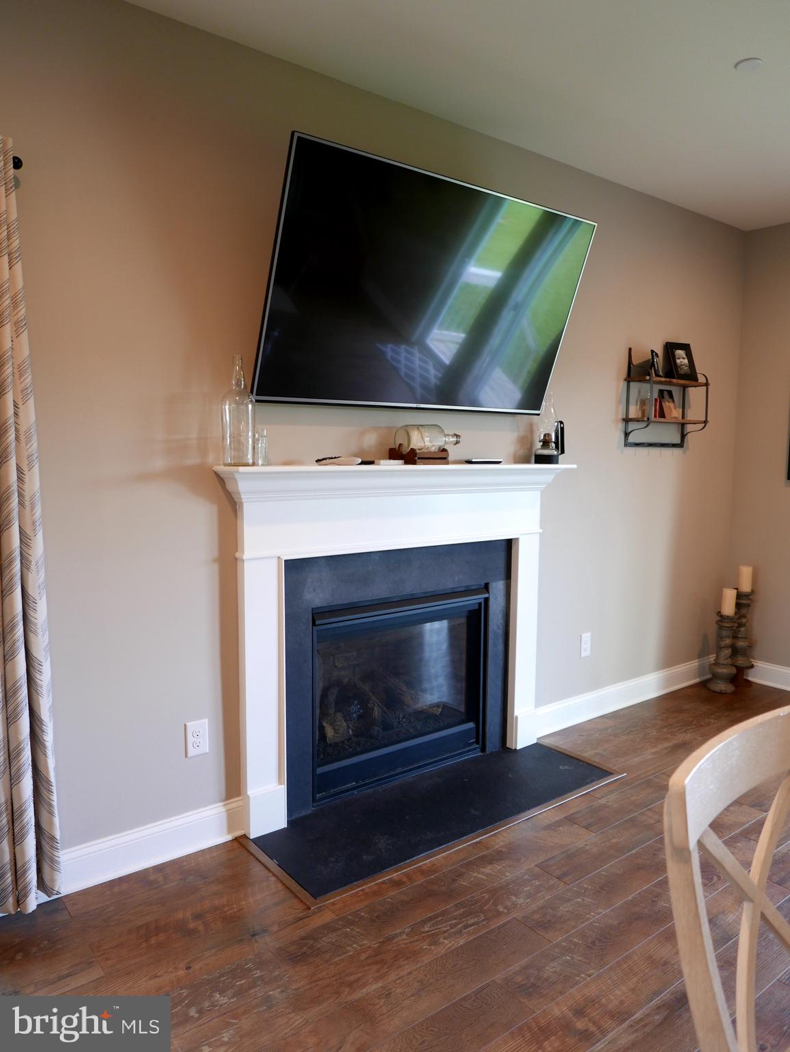 27980 Substation Road Denton, MD 21629 - Photo 21 of 48 Gas Fireplace and Mantel.