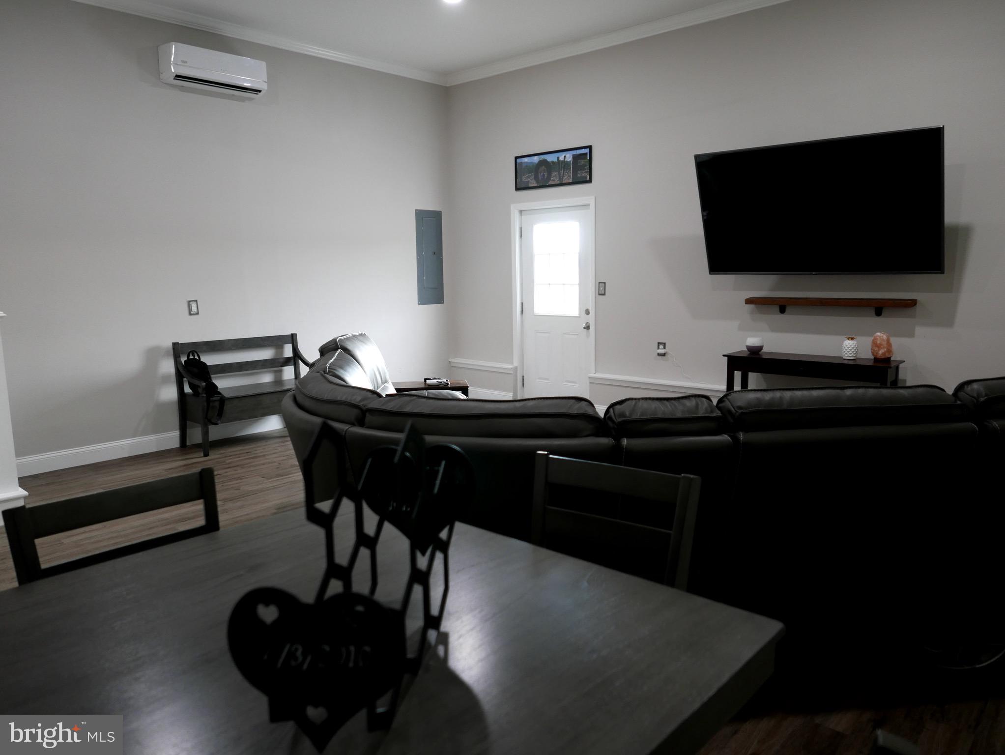 27980 Substation Road Denton, MD 21629 - Photo 27 of 48 Family room has split system heating & AC