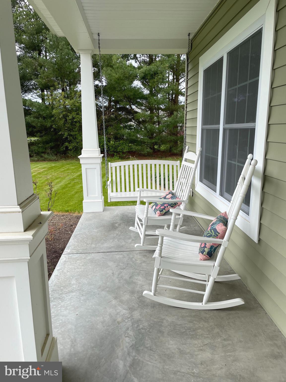 27980 Substation Road Denton, MD 21629 - Photo 9 of 48 Front porch and swing.