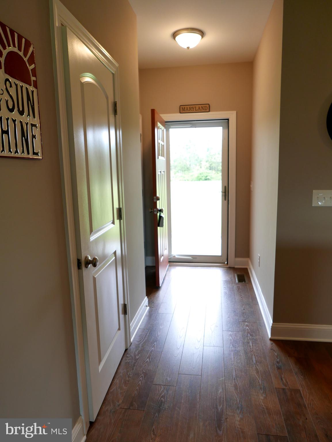 27980 Substation Road Denton, MD 21629 - Photo 10 of 48 Foyer with coat closet & 1/2 Bath