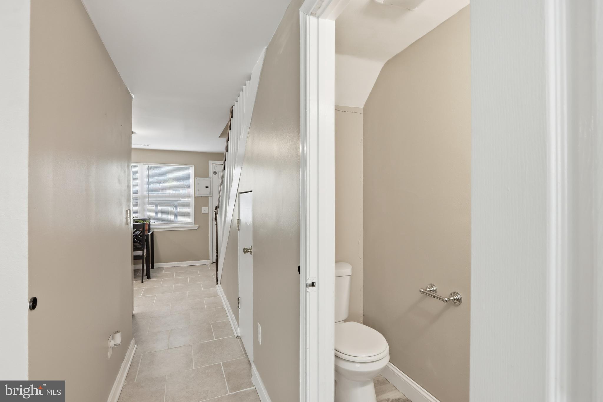 4432 Annapolis Road Baltimore, MD 21227 - Photo 13 of 31 a bathroom with a sink and toilet