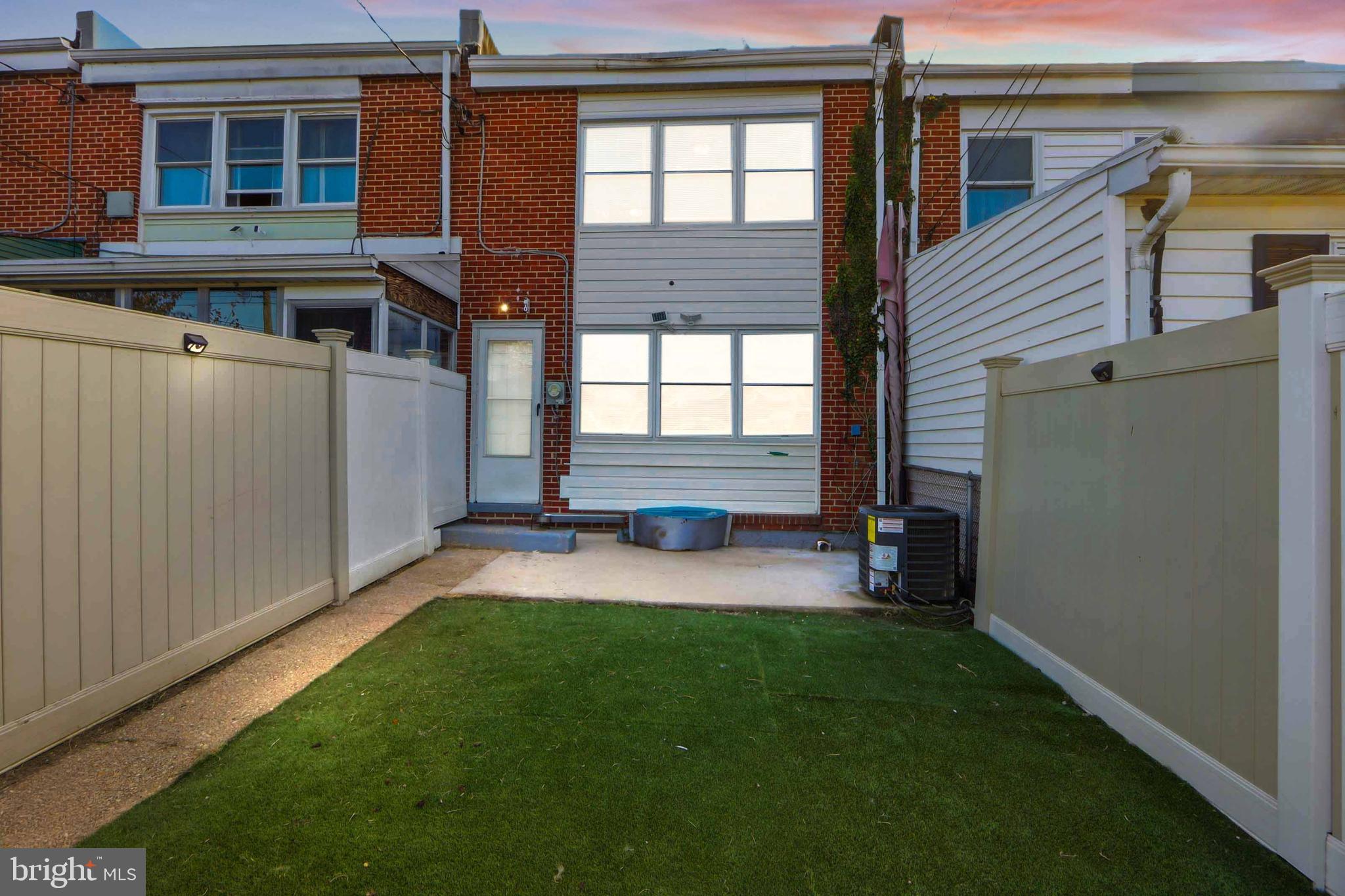 4432 Annapolis Road Baltimore, MD 21227 - Photo 2 of 31 a view of a backyard with a sitting area
