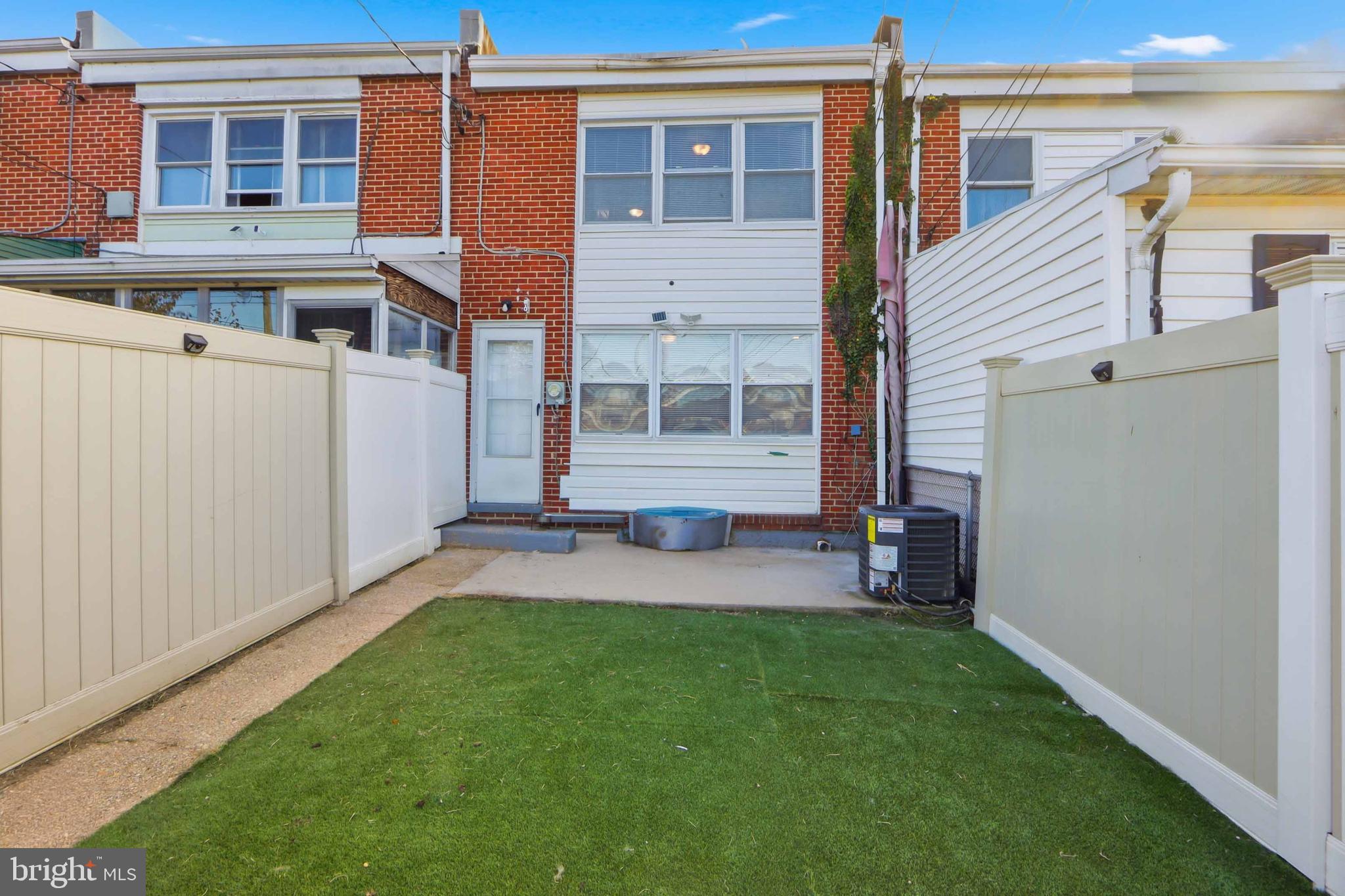 4432 Annapolis Road Baltimore, MD 21227 - Photo 30 of 31 front view of a house with a yard