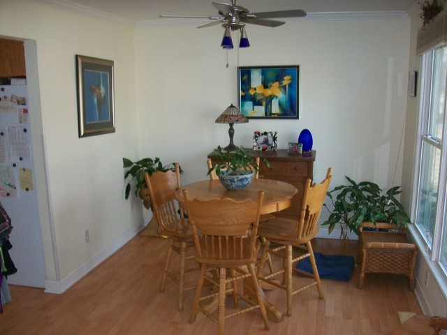 1224 Giese Road Batavia, IL 60510 - Photo 3 of 25 a view of a dining room with furniture and wooden floor