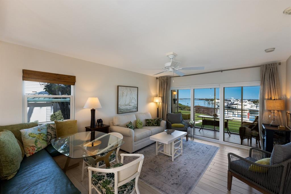 5850 Gasparilla Road, Unit M7 Boca Grande, FL 33921 - Photo 10 of 54 a living room with furniture and view of kitchen