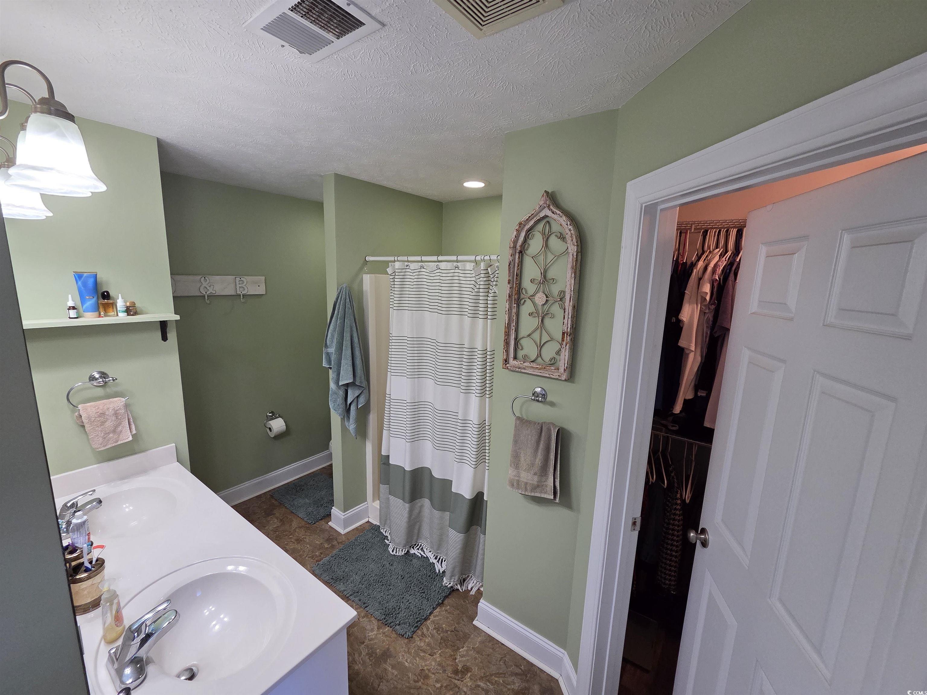 932 Eaglet Circle Conway, SC 29527 - Photo 27 of 40 Large double closets, double sinks, shower stall, jetted tub, double sinks, linen closet