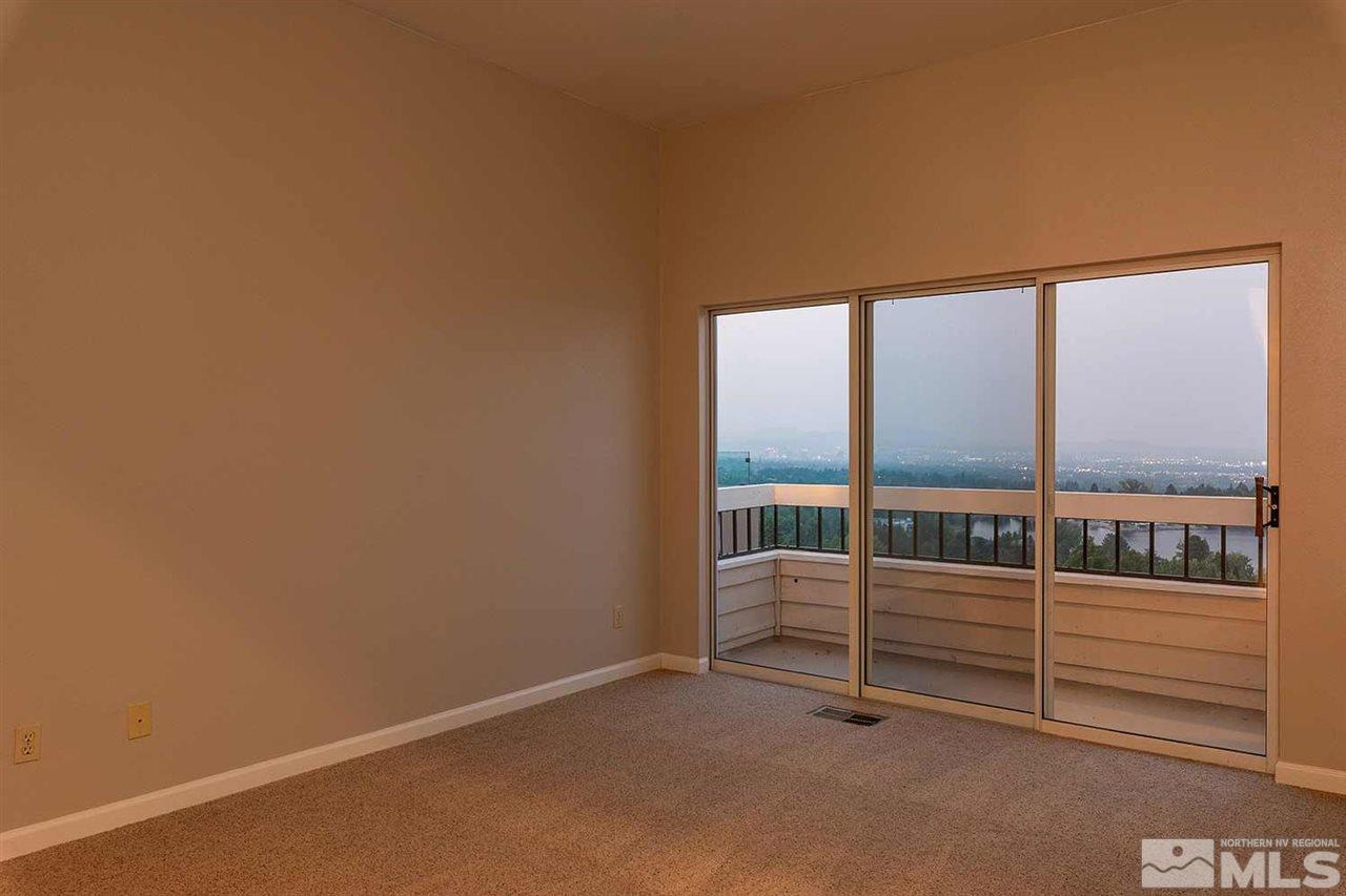 2969 Mountain Springs Road Reno, NV 89519 - Photo 15 of 25 an empty room with sliding door