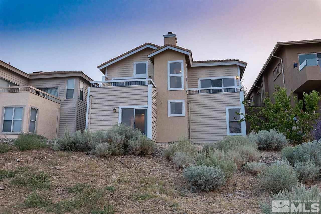 2969 Mountain Springs Road Reno, NV 89519 - Photo 6 of 25 a front view of a house with garden