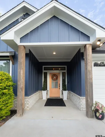 a front view of a house with a garage