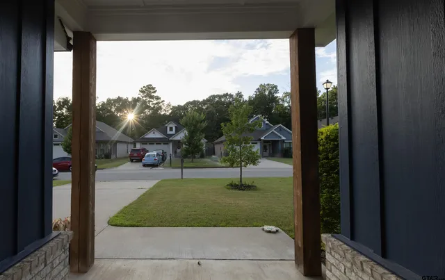 a view of a porch in front of a house