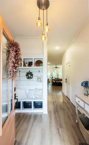 a view of a livingroom with furniture and a fireplace