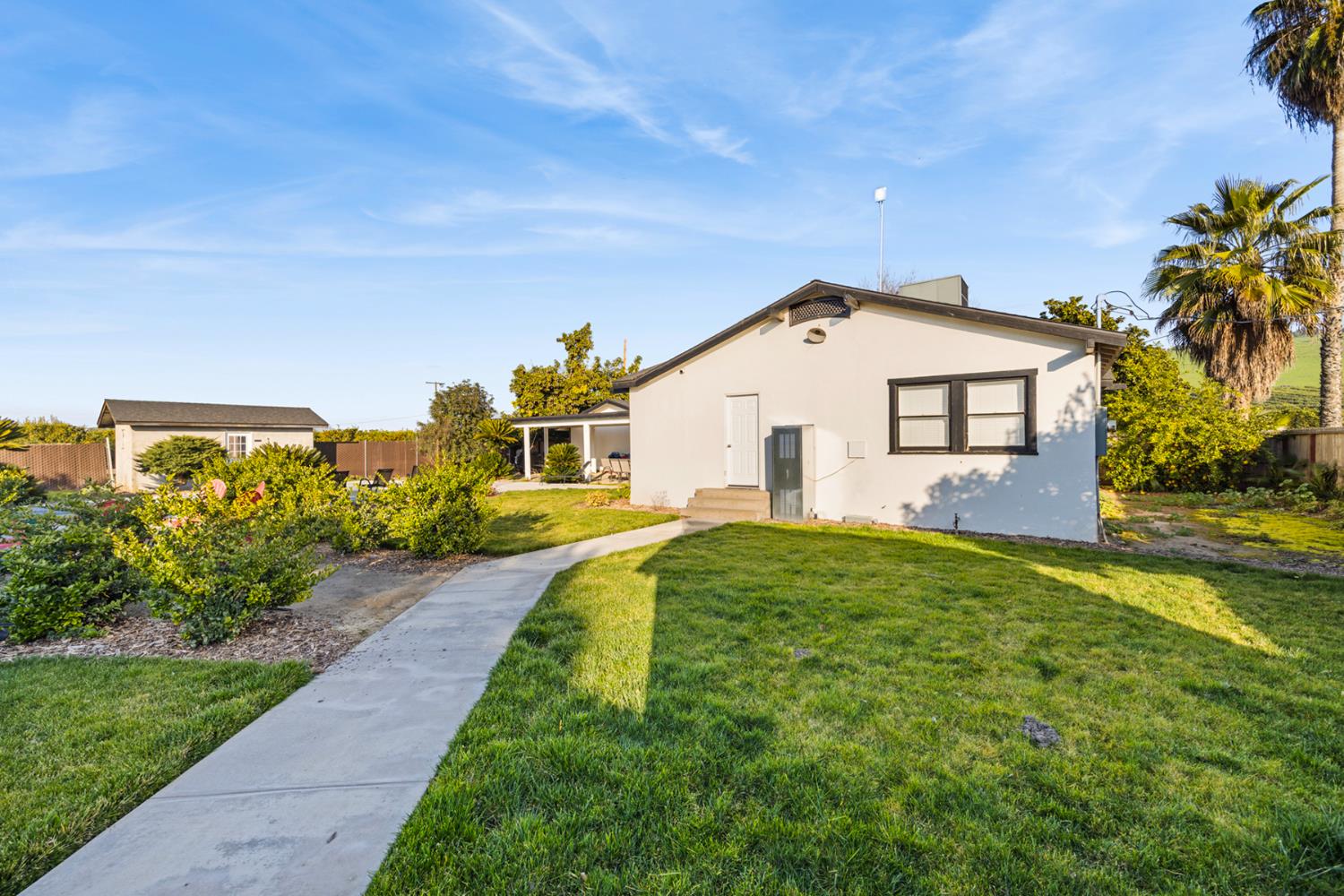 29205 Road 210 Exeter, CA 93221 - Photo 29 of 44 a front view of a house with a yard