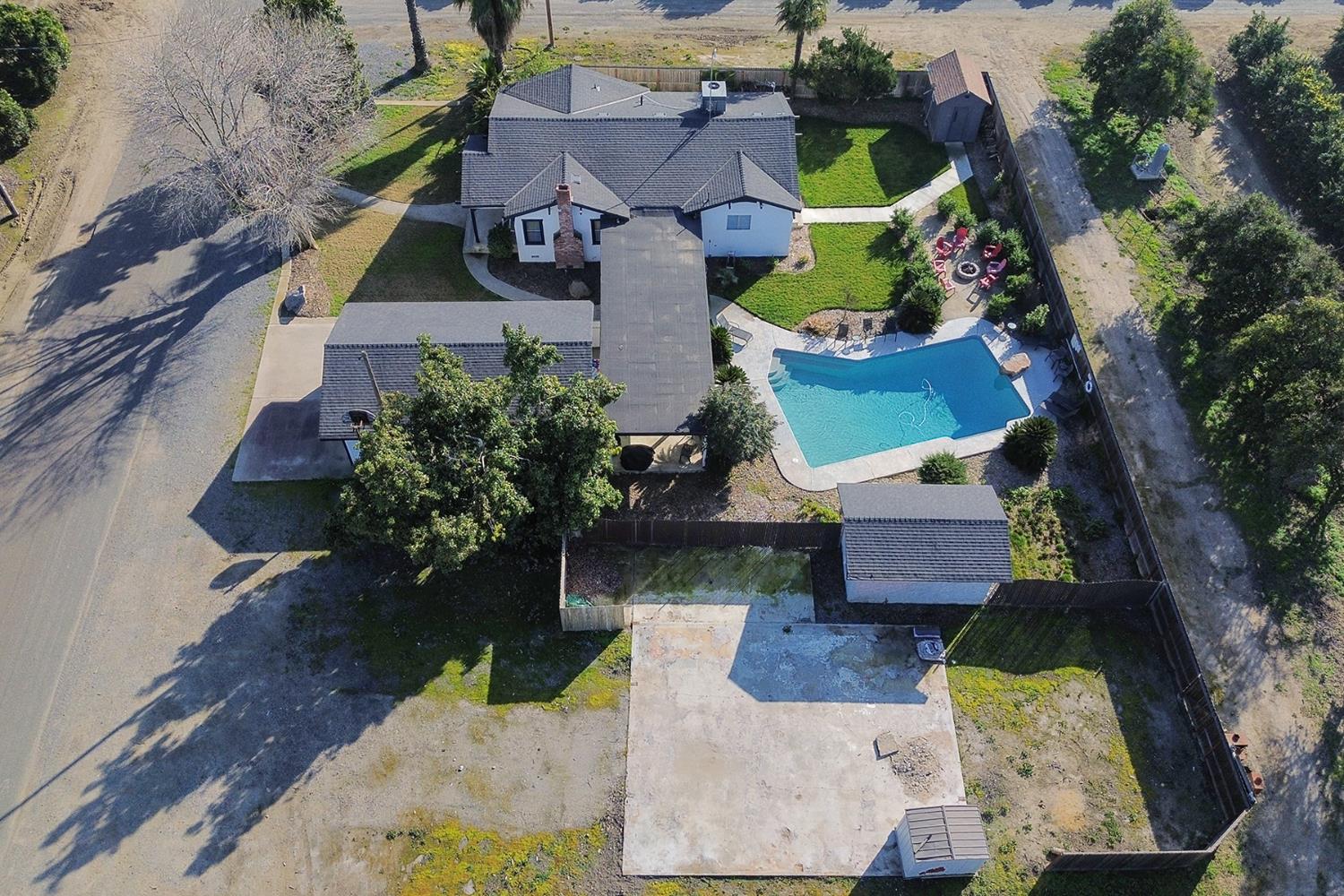 29205 Road 210 Exeter, CA 93221 - Photo 43 of 44 an aerial view of a house with a garden and yard