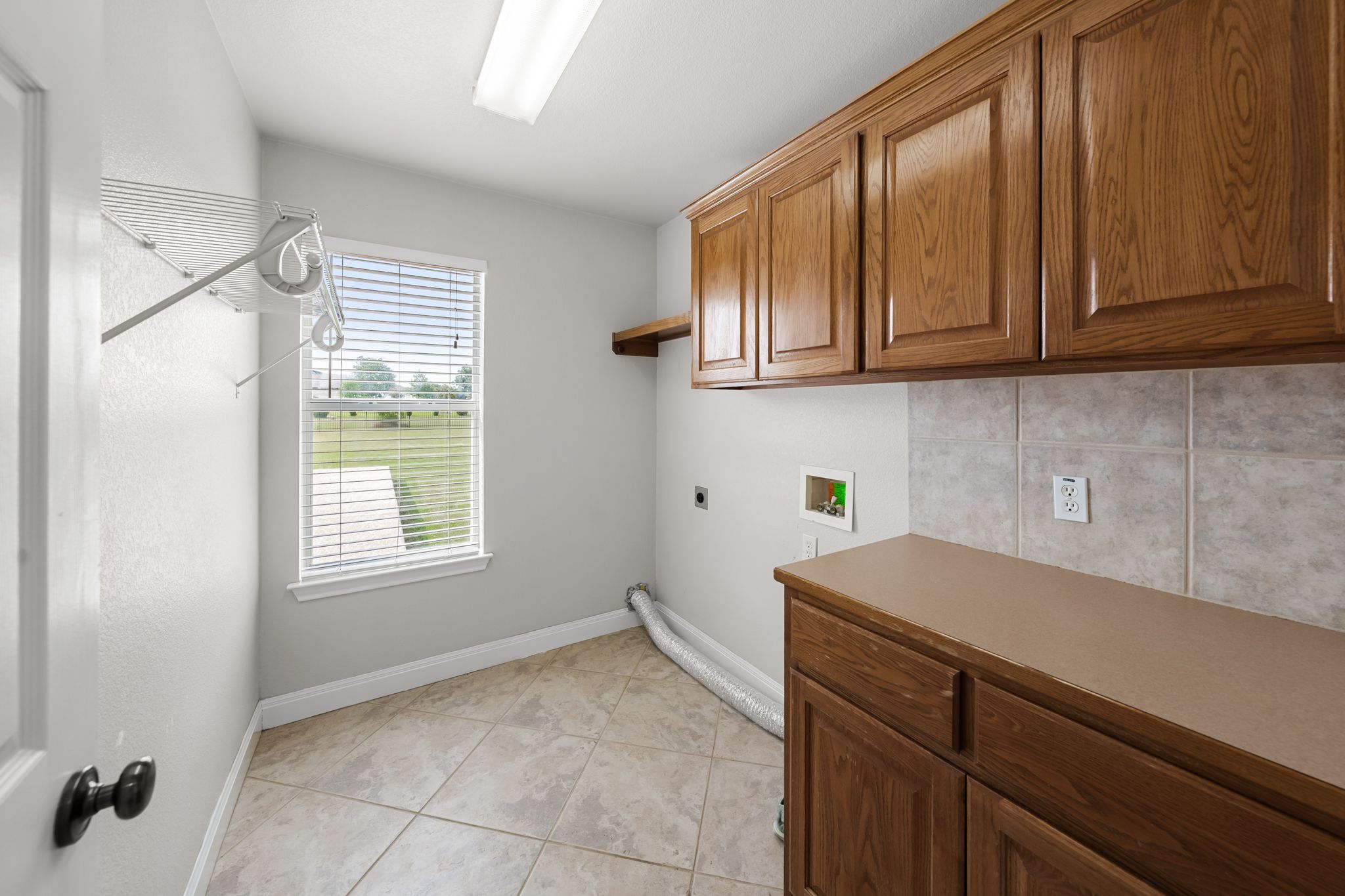 110 Starlight Trail Georgetown, TX 78633 - Photo 13 of 36 Oversized laundry room with tons of storage and natural light