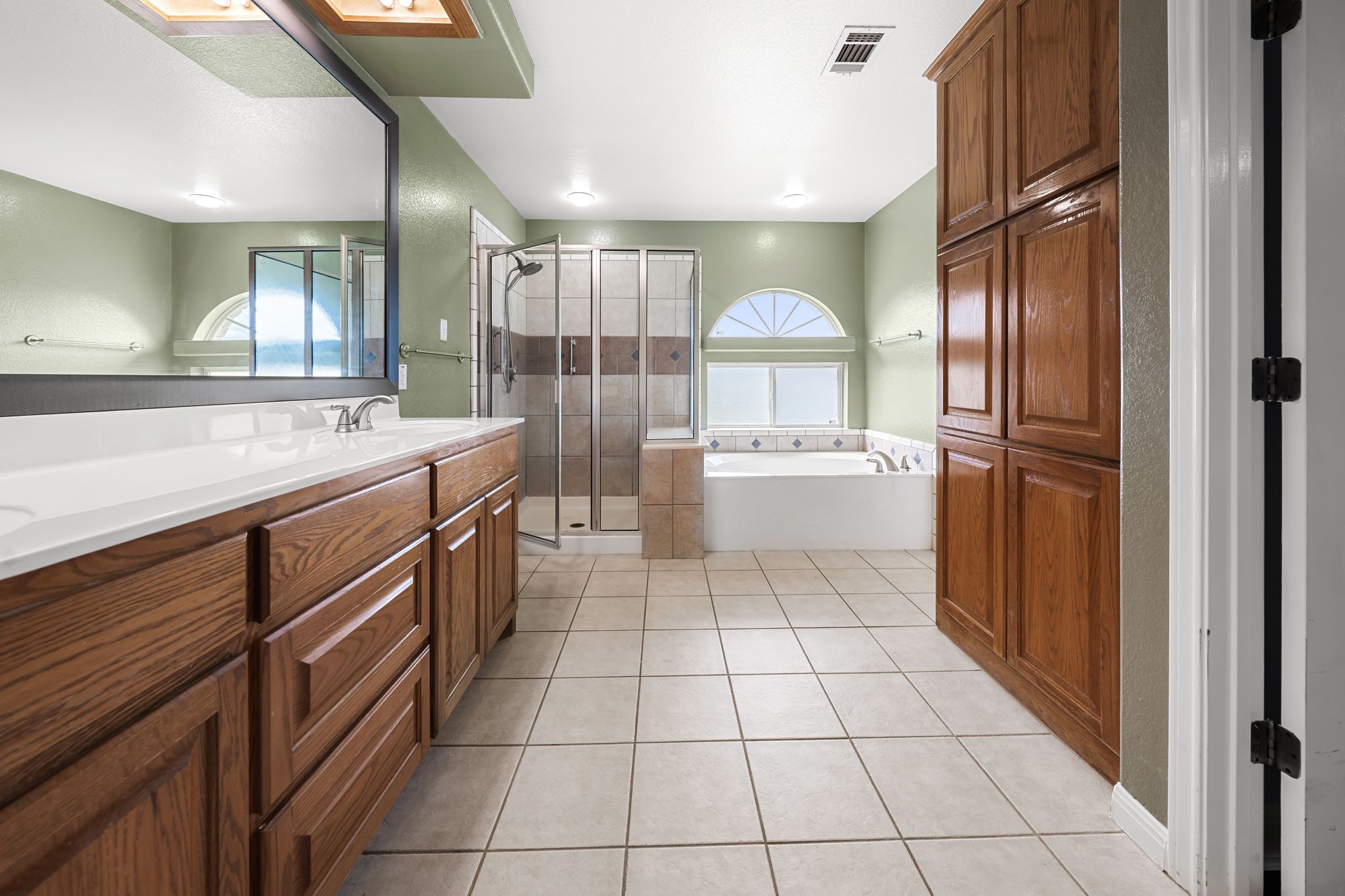 110 Starlight Trail Georgetown, TX 78633 - Photo 21 of 36 Spacious primary bath with dual vanities, soaking tub, and walk-in shower