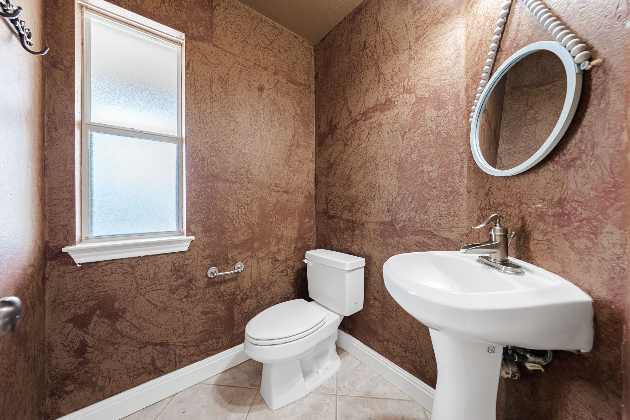 110 Starlight Trail Georgetown, TX 78633 - Photo 26 of 36 Stylish powder room with pedestal sink and frosted window