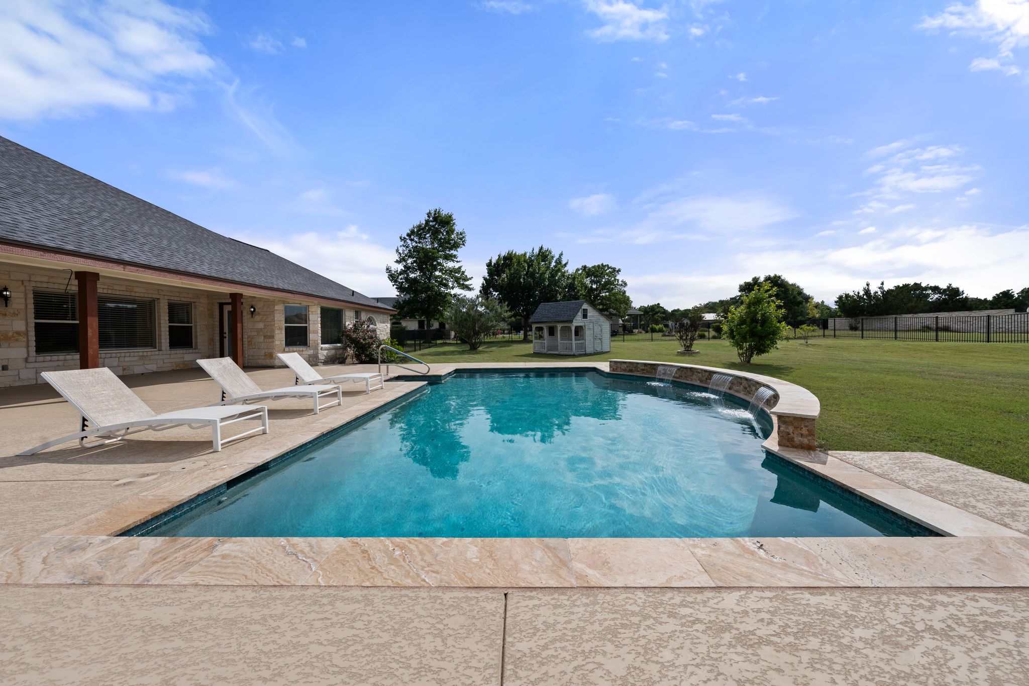 110 Starlight Trail Georgetown, TX 78633 - Photo 27 of 36 Outdoor pool featuring a patio and an outbuilding