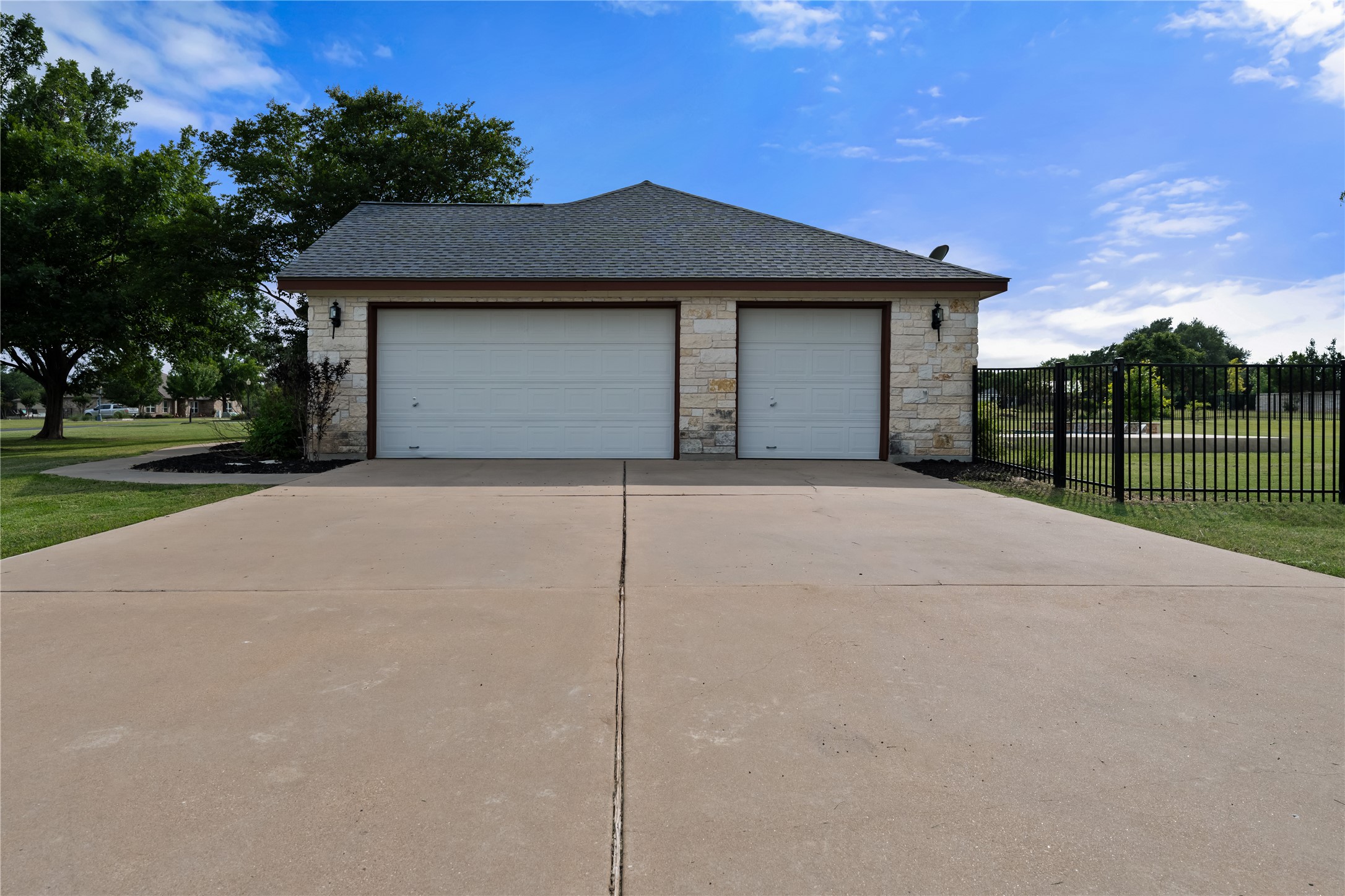 110 Starlight Trail Georgetown, TX 78633 - Photo 36 of 36 Spacious 3 car garage—plenty of room for vehicles and storage